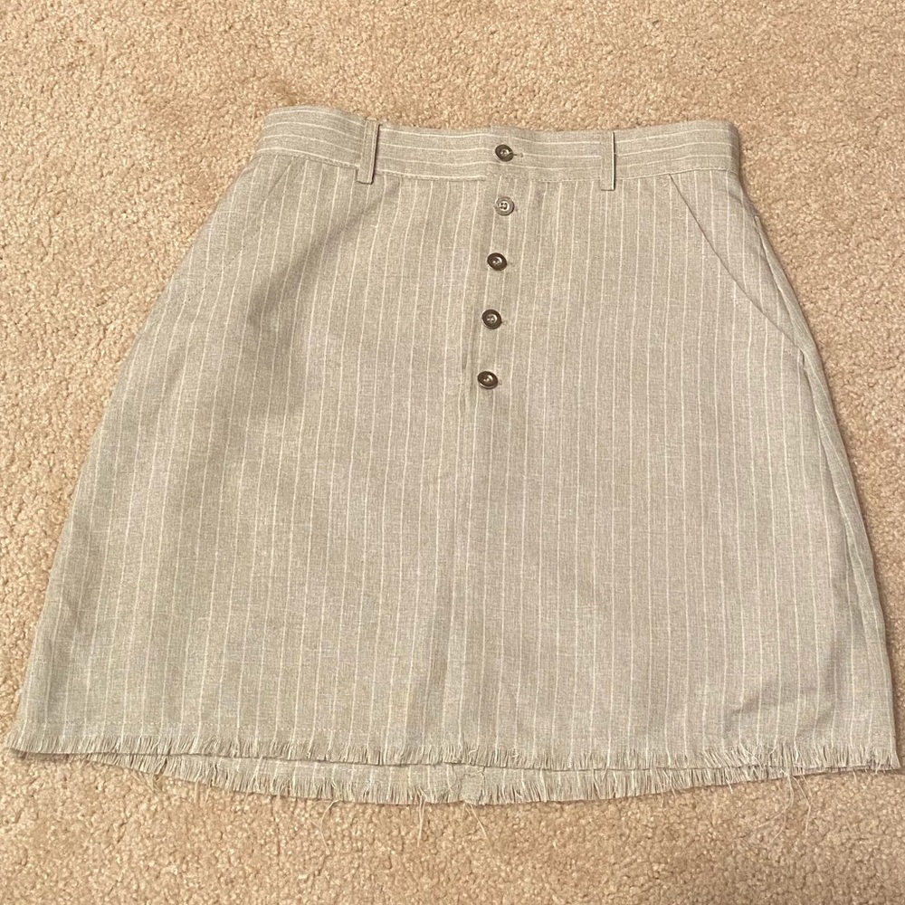 Beige button up mini skirt with pockets